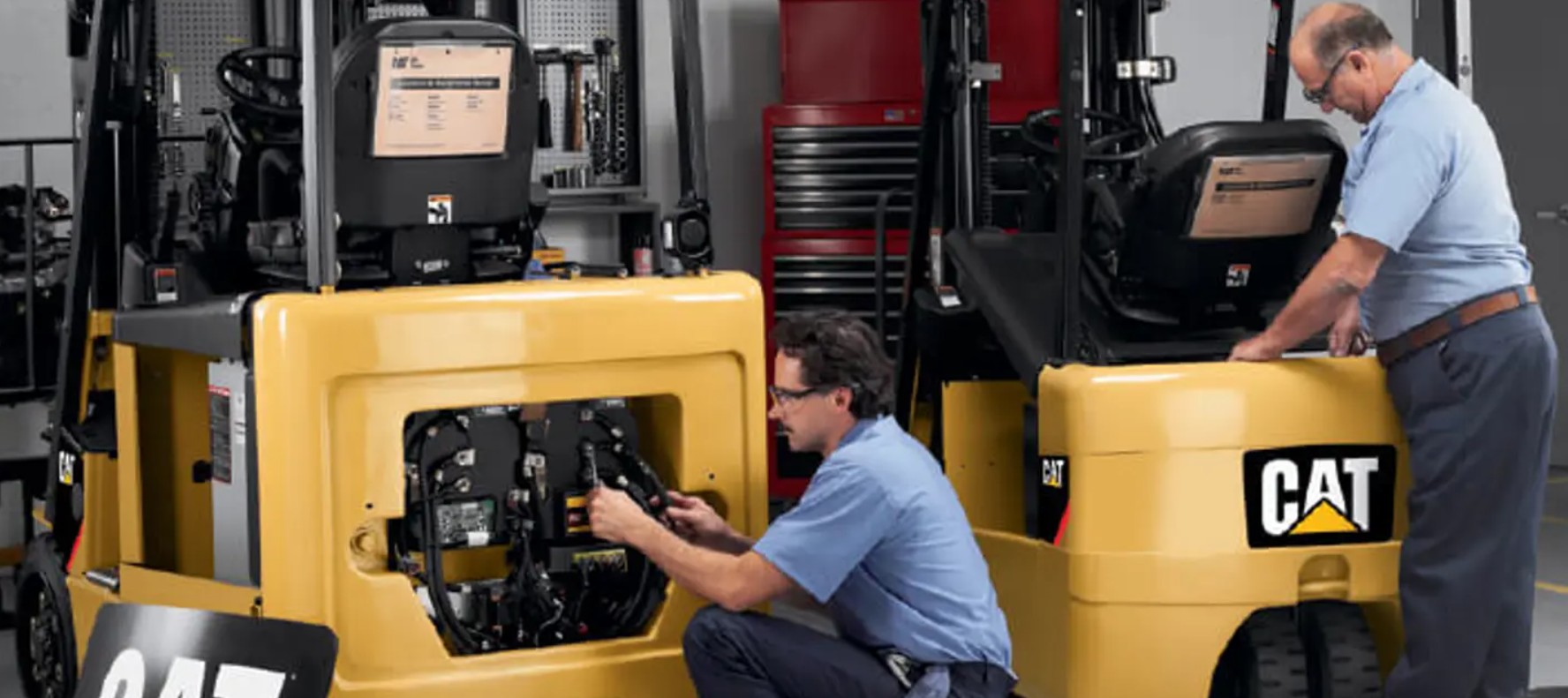 megantis about technicians working on a forklift